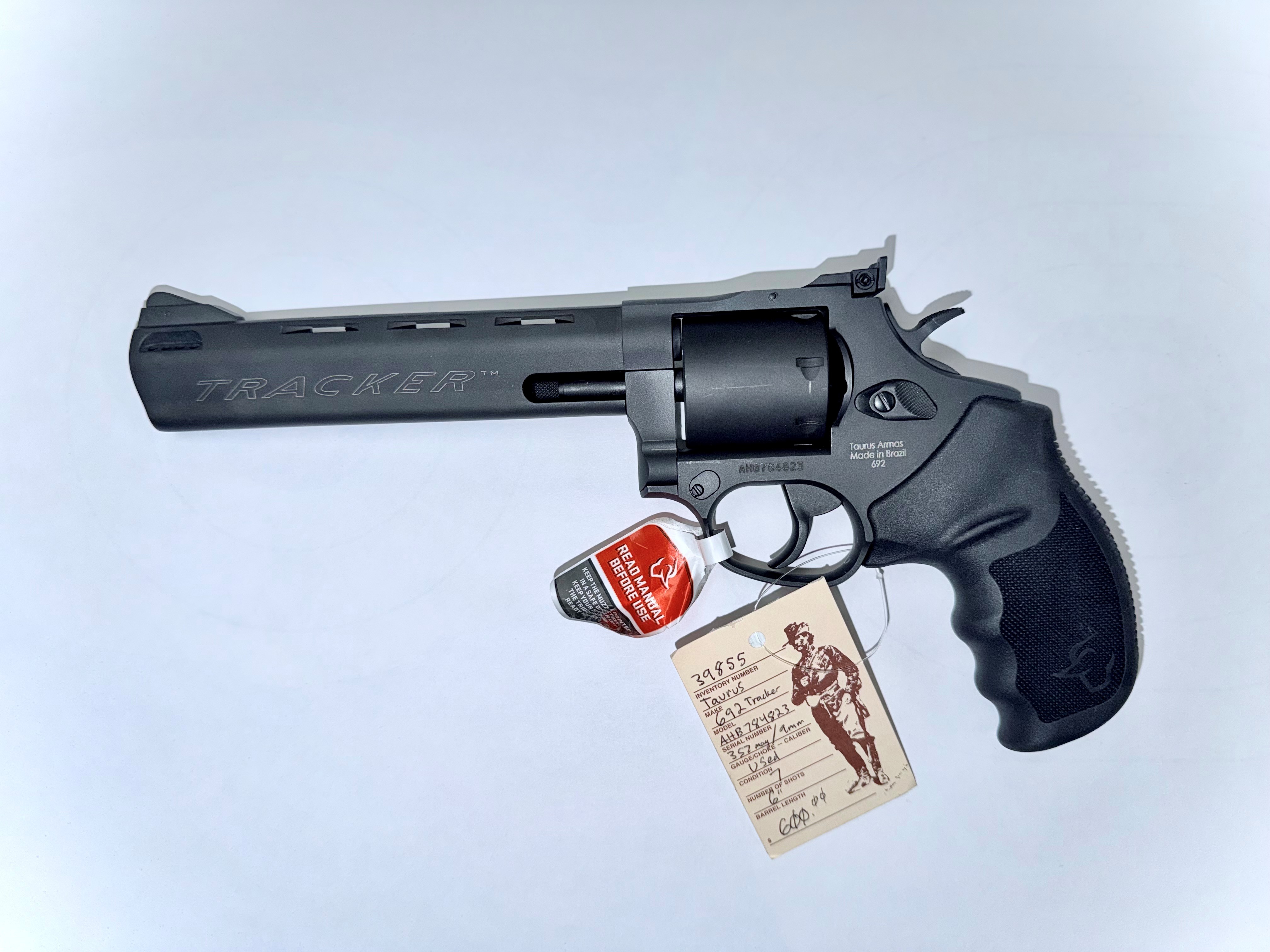 TAURUS 692 TRACKER, 357/9MM 6" BLUED, USED W/CASE AND MOON CLIPS TAURUS 692 TRACKER, 357/9MM 6" BLUED, USED W/CASE AND MOON CLIPS